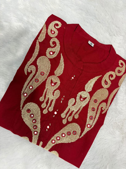 Side perspective of the fully stitched summer special maroon cotton tunic highlighting the comfortable short sleeves and clean tailored seams.