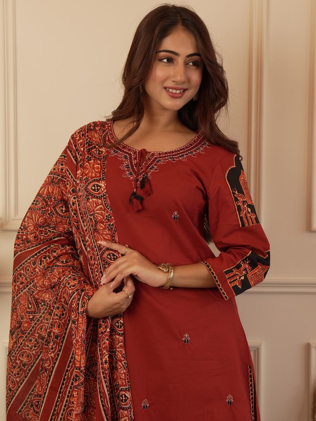 Side perspective presentation of the fully stitched maroon ethnic kurta highlighting the premium clean seams and functional integrated one side pocket.