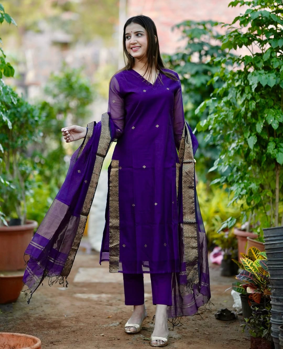 Full layout view of the royal purple woven jamdani dupatta scarf displaying the continuous loom patterns and decorative border tassels.