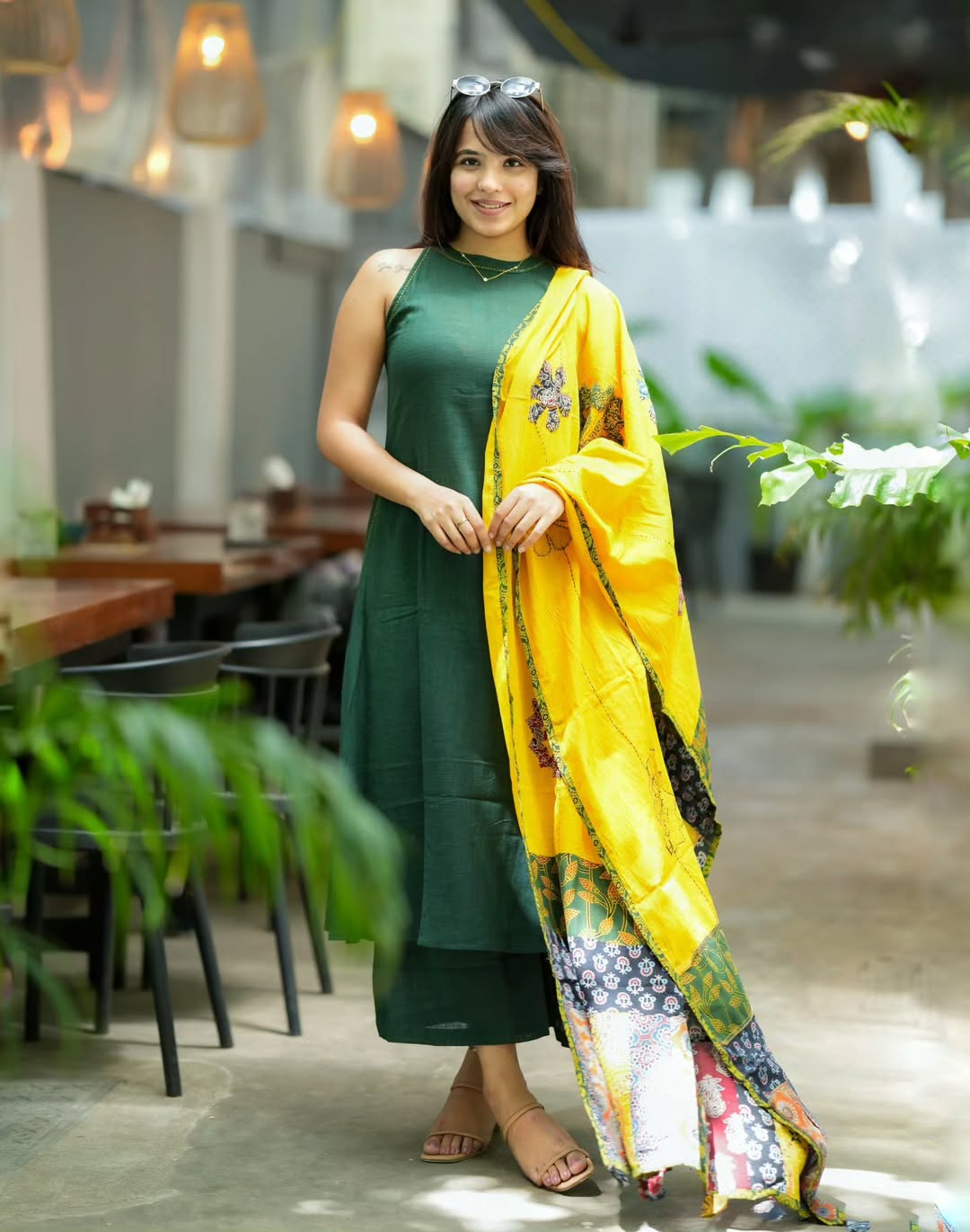 Interior view of the green handloom kurta displaying the unstitched extra sleeves fabric attached inside securely for customization.