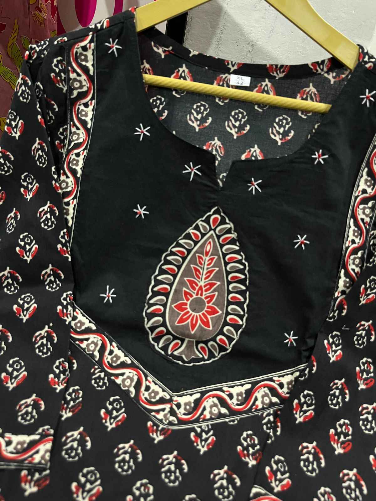 High resolution view of the premium black pure cotton one hundred by one hundred dupatta scarf showcasing the soft breathable weave and neat borders.