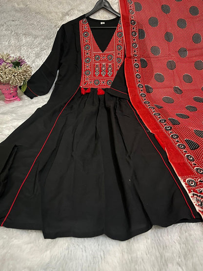 Side perspective presentation of the fully stitched black ethnic top highlighting the clean tailored seams and standard regular straight fit outline.