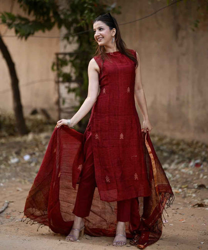 Detailed view of the maroon kurti back profile showcasing the classic elegant button closure placement on the high neck boundary.