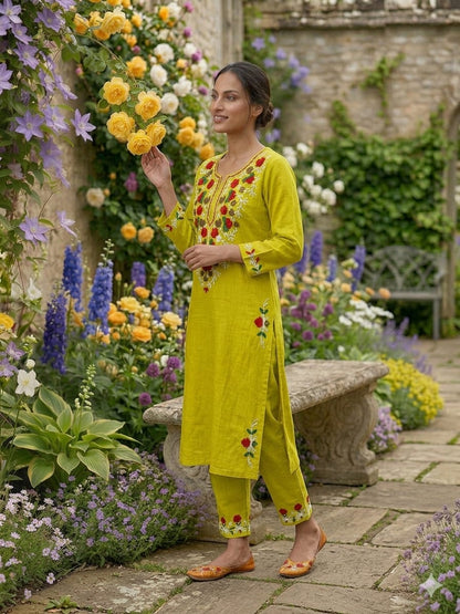 Front close view of the matching lemon green cotton palazzo pants showing the relaxed wide leg opening and clean structural stitching lines.
