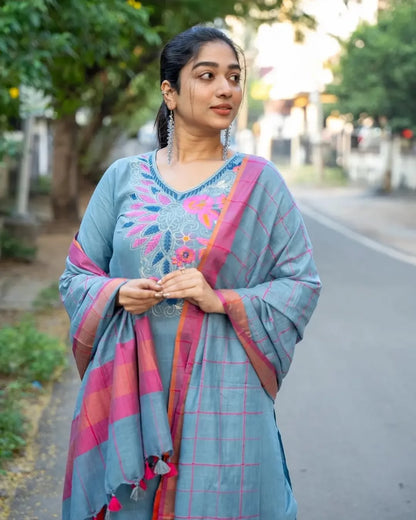 Rear angle presentation of the sky blue ethnic top showcasing the unique premium button detailing placed along the upper back fabric seam line.