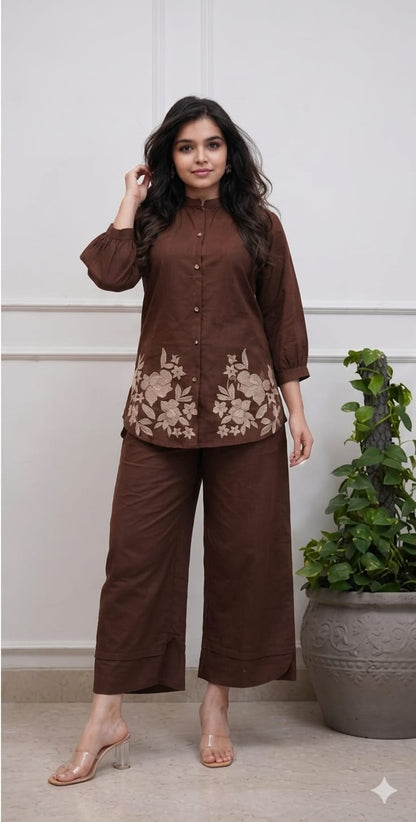 Detailed front view of the coffee brown matching trousers showcasing the comfortable waist area and straight leg opening tailoring.
