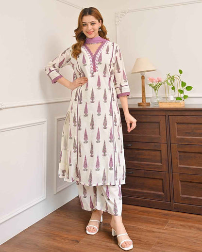 Front view of full purple Mughal printed 3 piece suit set displaying the lace work tunic printed trousers and matching mul cotton dupatta.