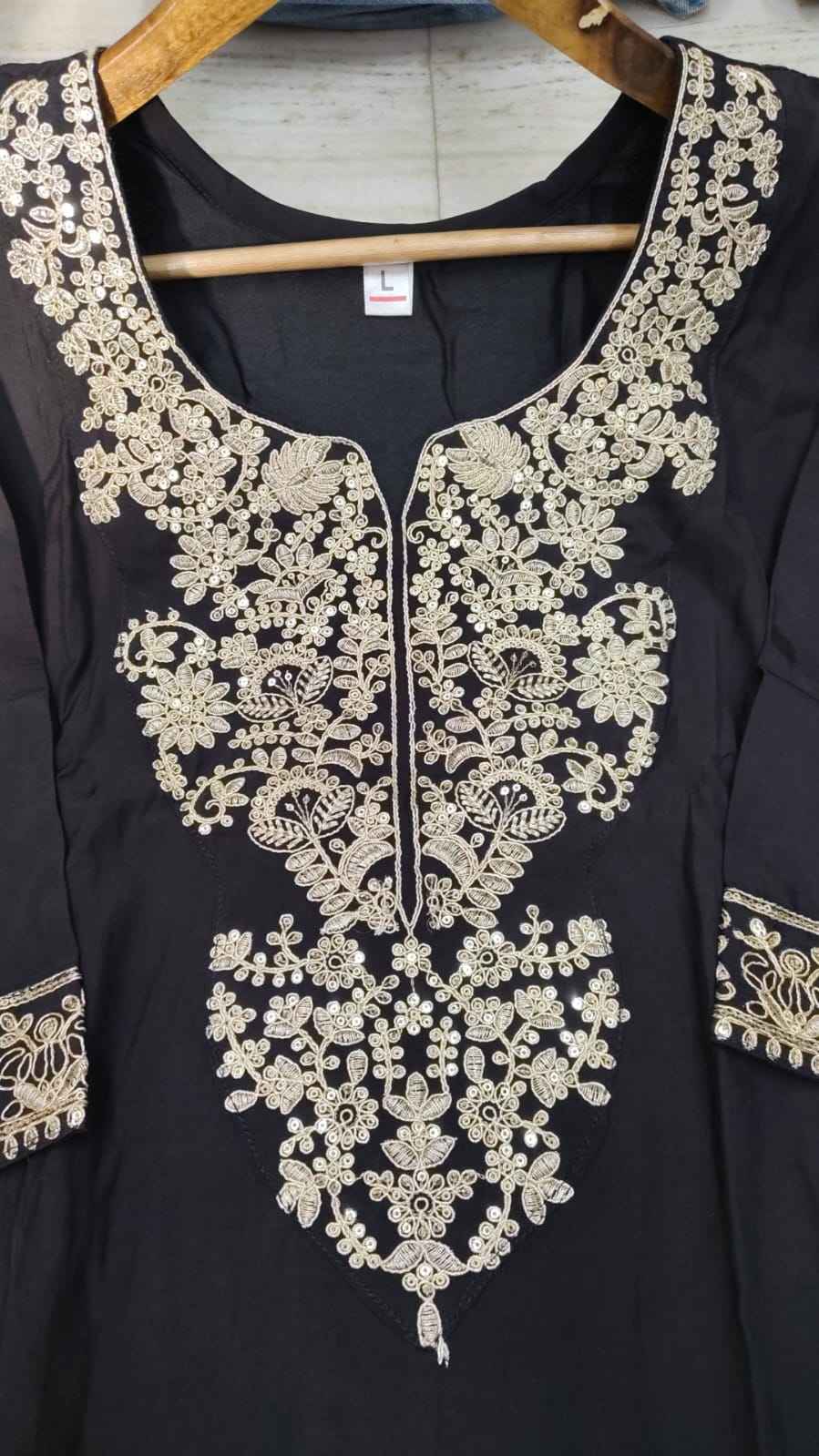 Detailed view of the inner bodice profile showcasing the attached soft comfortable lining layer inside the black embroidered roman silk kurta.