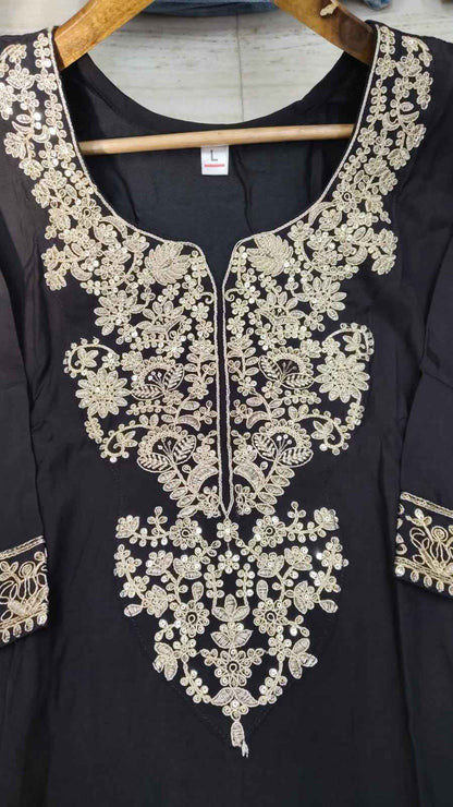 Detailed view of the inner bodice profile showcasing the attached soft comfortable lining layer inside the black embroidered roman silk kurta.