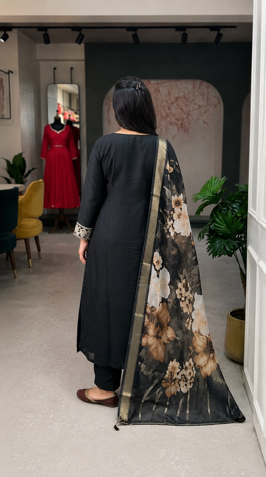 Back angle presentation of the black festive silk kurta showing the uniform solid tone structure and clean professional shoulder tailoring.