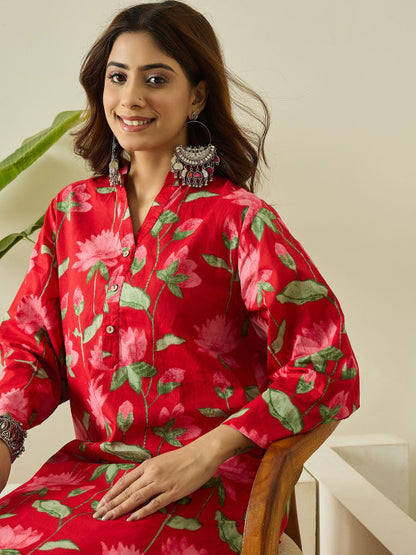 Close up view of detailed traditional printing patterns on a rich red imported cotton fabric bodice canvas.