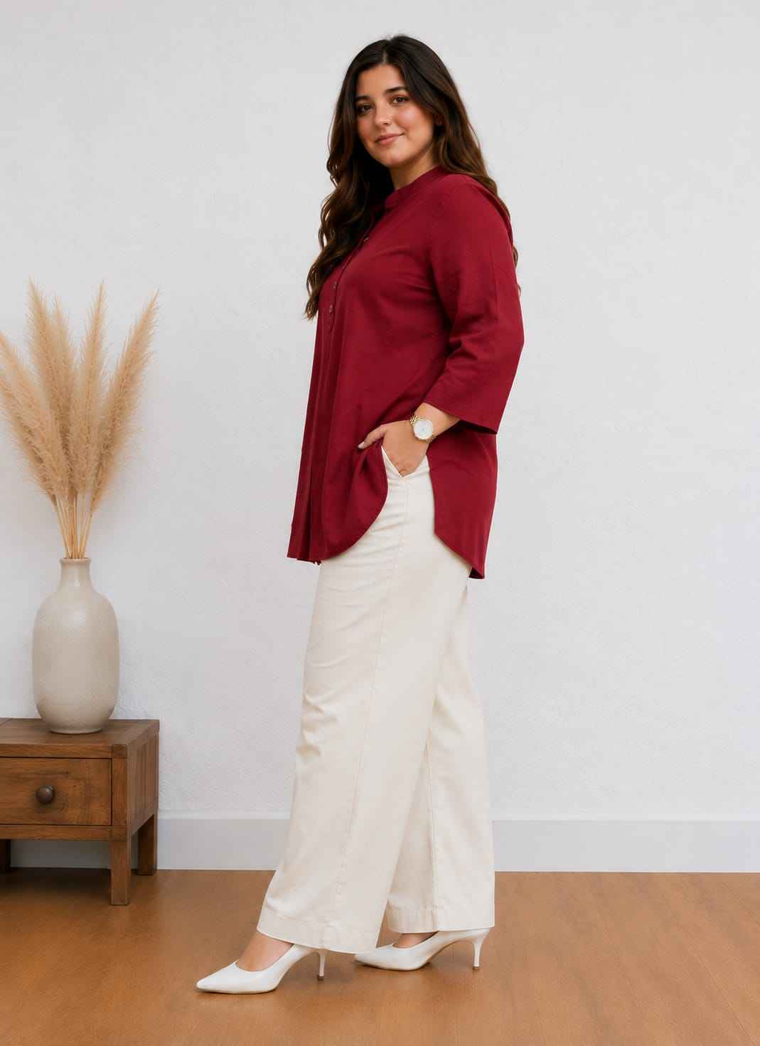 Front view of full two piece maroon elegant cotton kurti pant set displaying a straight fit button details tunic top and matching trousers.