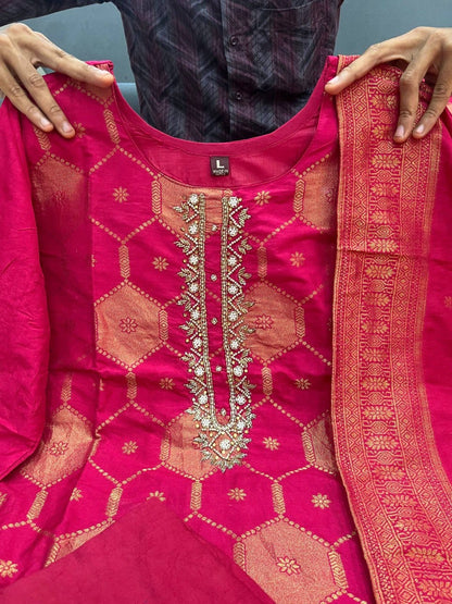 Front close view of the matching dark pink maharaja silk trousers pants showing the luxurious material texture and structured waist area.