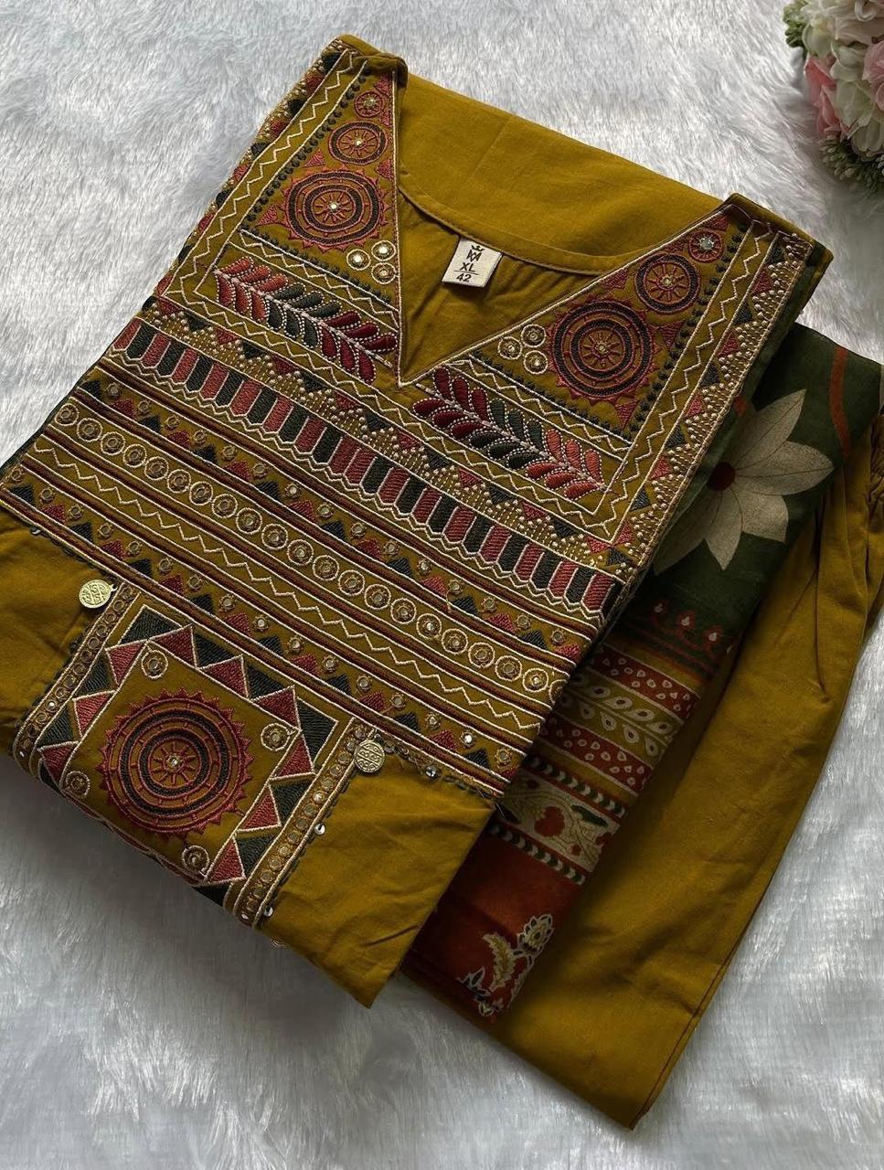 Detailed front view of the matching yellow cotton pants showing the structured comfortable waistband and neat lower hemline tailoring.