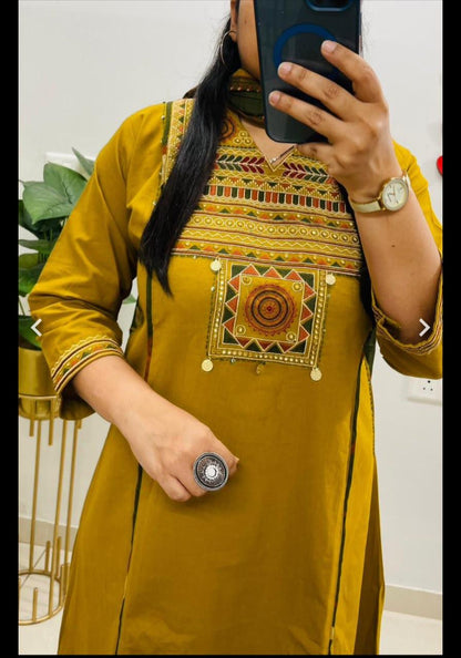 Side perspective presentation of the fully stitched yellow casual ethnic tunic highlighting the clean tailored side seams and straight fit outline.