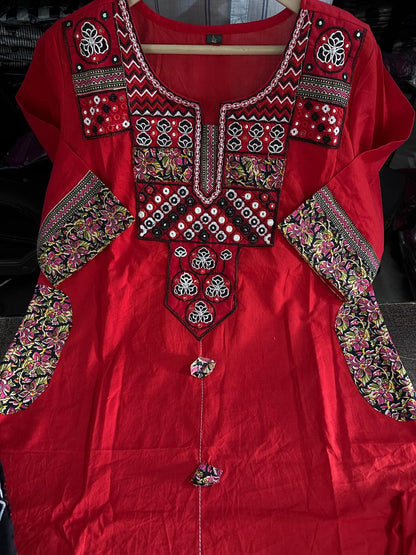 Detailed front view of the matching red cotton pants showing the structured comfortable waistband and neat lower hemline tailoring - WishTown Fashion Club