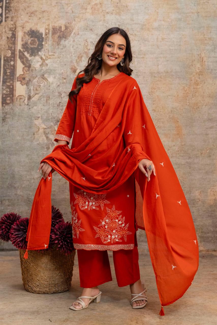 Front view of full three piece orange heavy cotton embroidery work kurti set displaying an embroidered tunic top straight pants and matching cotton dupatta - WishTown Fashion Club