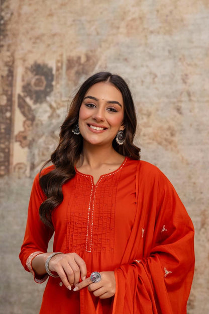 Side perspective presentation of the fully stitched orange casual tunic highlighting the clean tailored side seams and relaxed fit outline - WishTown Fashion Club