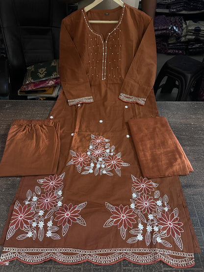 Close up view of detailed traditional embroidery work and high quality thread patterns on a deep coffee brown heavy cotton fabric bodice canvas - WishTown Fashion Club