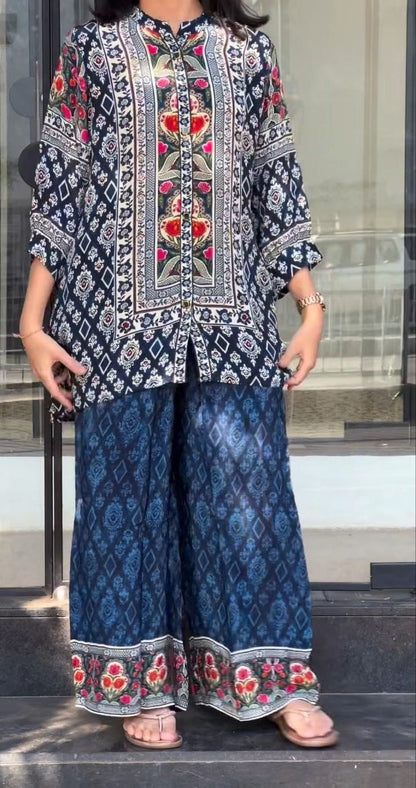 Front view of designer two piece navy pure natural crape co ord set displaying matching tunic top and wide leg palazzo pants