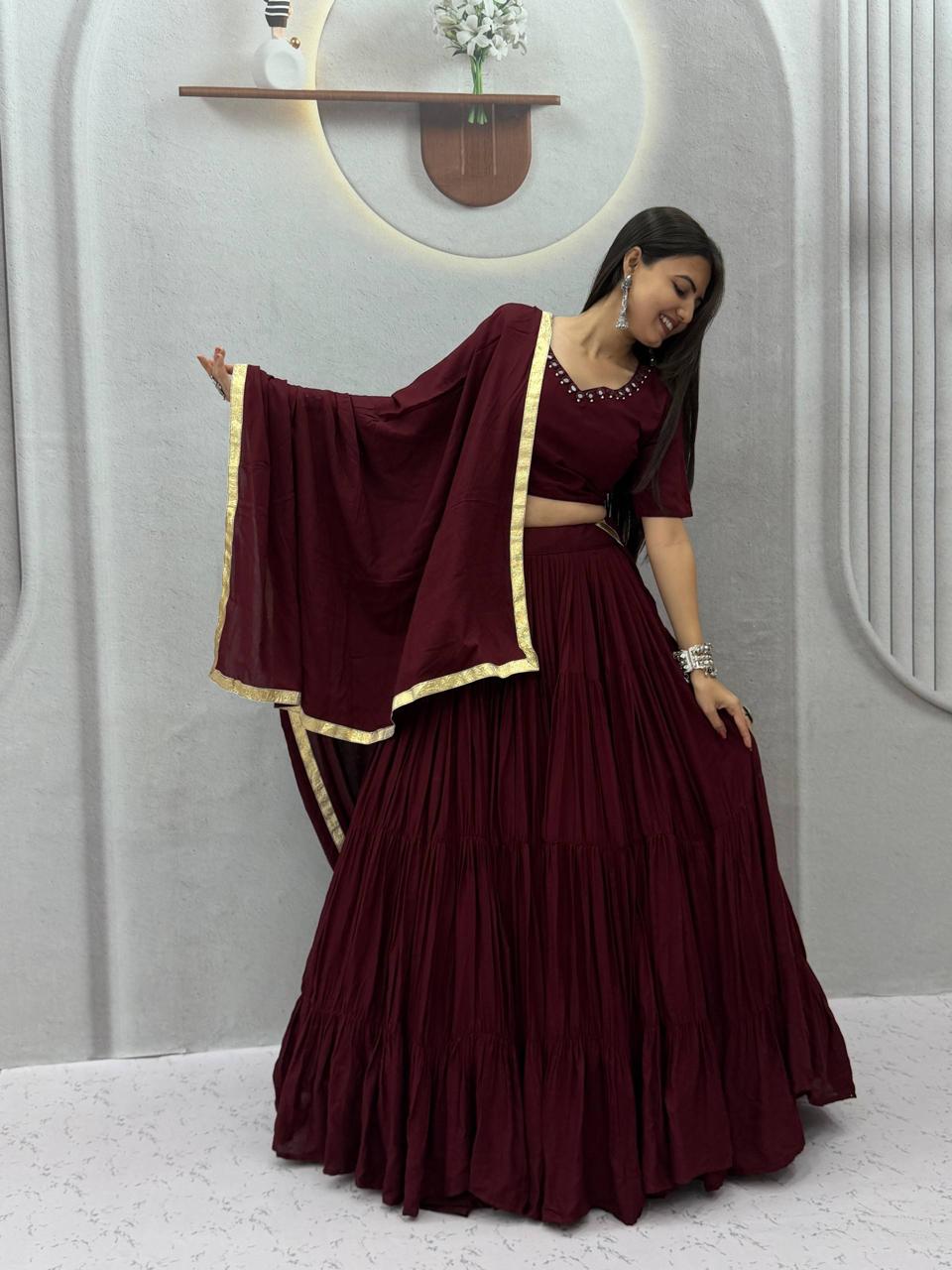 Wide angle view showcasing the massive nine plus meter flair and twirl volume of maroon rayon cotton lehenga skirt - WishTown Fashion Club
