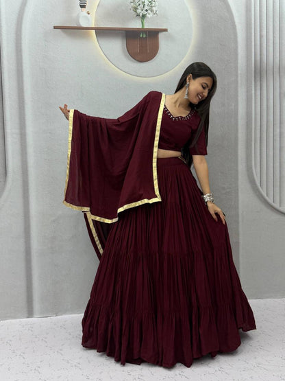 Wide angle view showcasing the massive nine plus meter flair and twirl volume of maroon rayon cotton lehenga skirt - WishTown Fashion Club