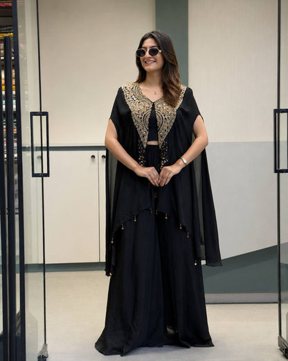 Close up view of 5mm sequins and zari embroidery work with handwork coin lace on black star georgette jacket - WishTown Fashion Club