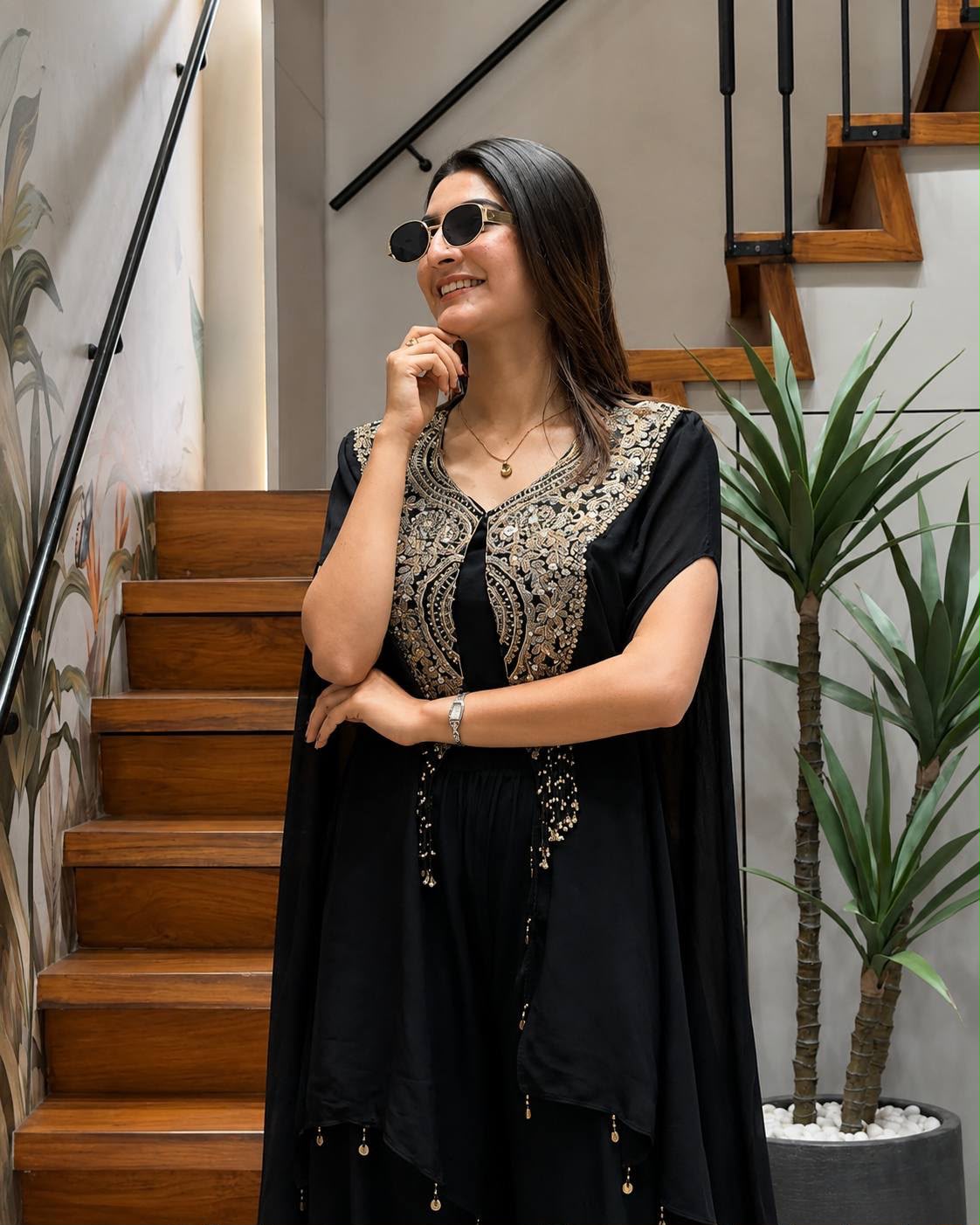 Side profile view of black star georgette jacket showing clean side cuts and forty-seven to forty-eight inch length - WishTown Fashion Club
