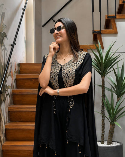 Side profile view of black star georgette jacket showing clean side cuts and forty-seven to forty-eight inch length - WishTown Fashion Club