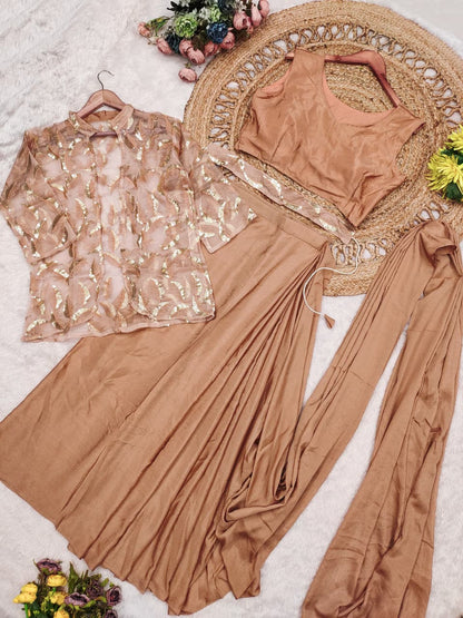 Close up view of detailed multi-thread embroidery work and shimmering sequence detailing on peach organza jacket - WishTown Fashion Club