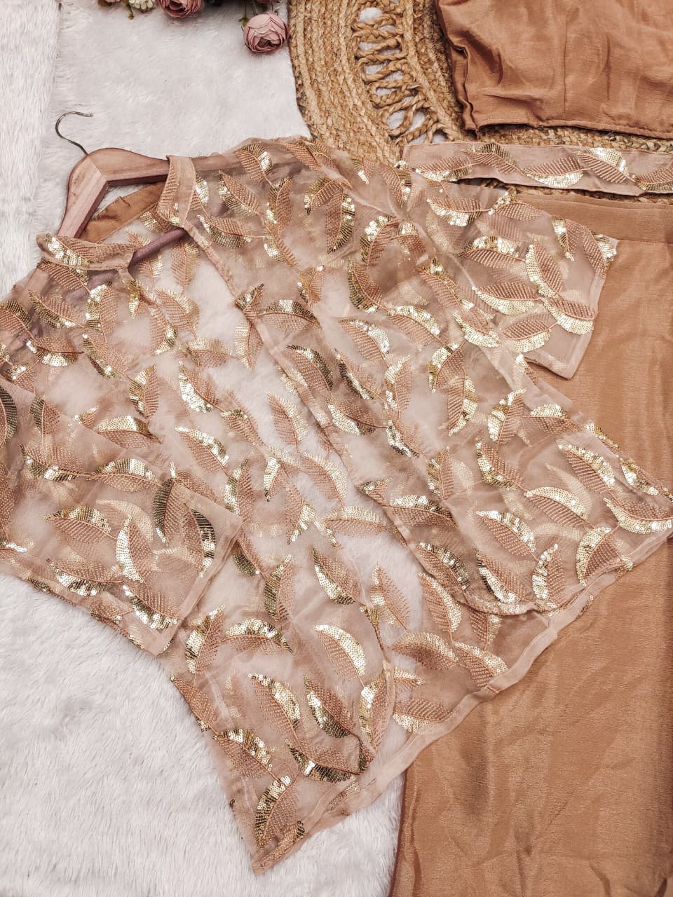 Detailed view of peach fully stitched chinnon silk blouse highlighting size forty-two to forty-four margin construction - WishTown Fashion Club
