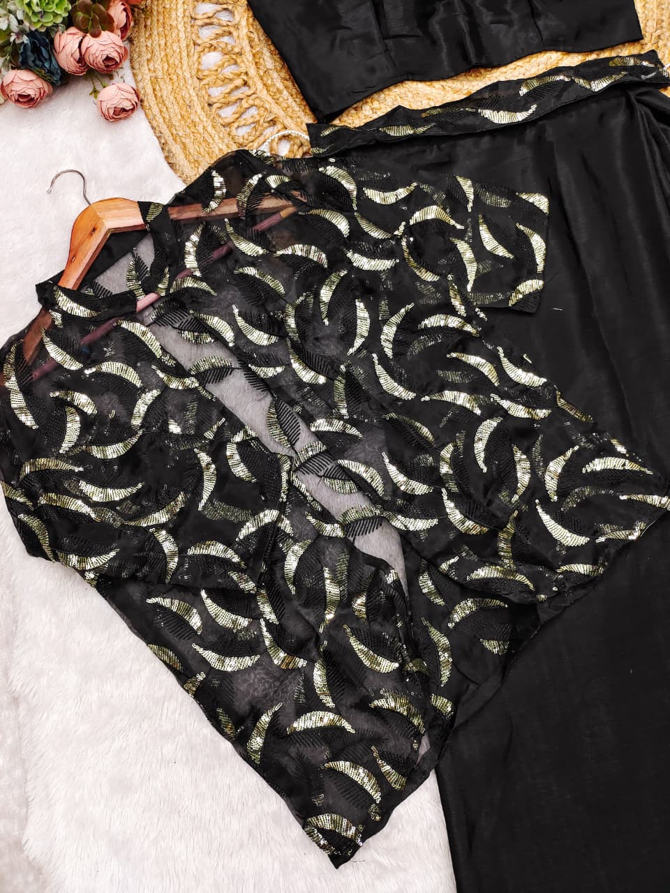 Detailed view of black fully stitched chinnon silk blouse highlighting size forty-two to forty-four margin construction - WishTown Fashion Club