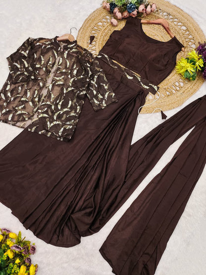 Close up view of detailed multi-thread embroidery work and shimmering sequence detailing on coffee brown organza jacket - WishTown Fashion Club