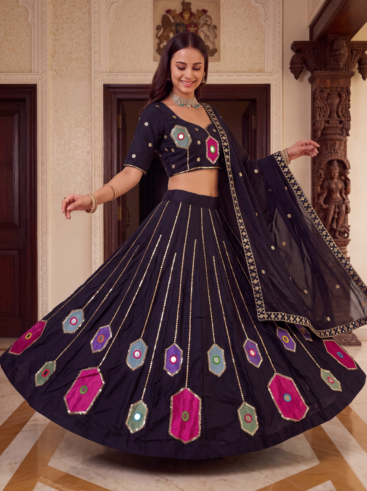 Front view of black rayon embroidery hand mirror lehenga choli with matching stitched blouse and dupatta - WishTown Fashion Club