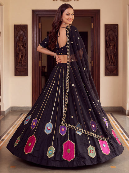 Side profile presentation of black rayon lehenga displaying six meter flare and structured canvas stitching - WishTown Fashion Club