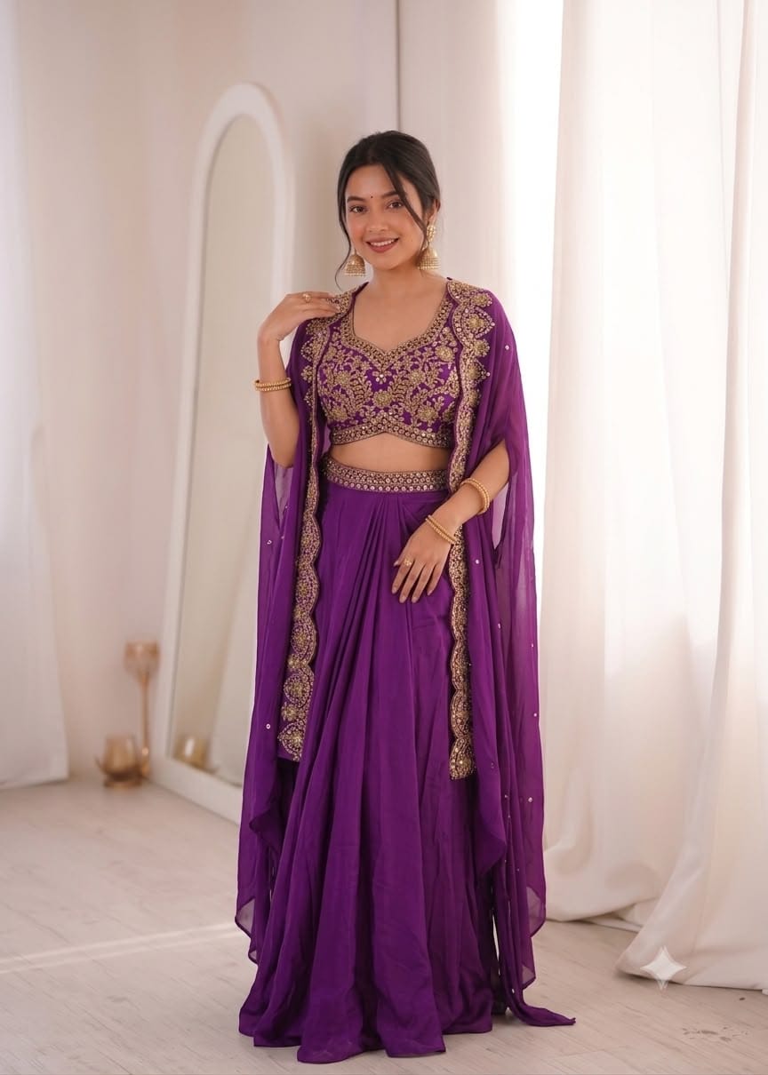 Close up shot of intricate front embroidery and ladkan embellishments on purple crep blouse - WishTown Fashion Club