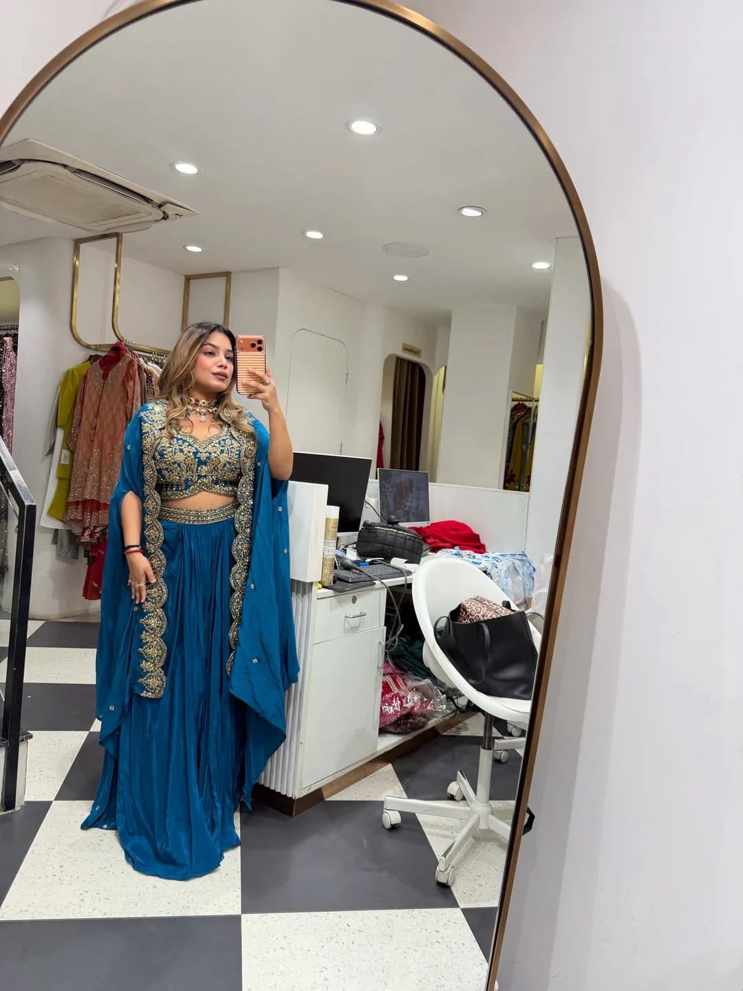 Detailed close up of front embroidery and hanging ladkan work on teal blue natural crep blouse - WishTown Fashion Club