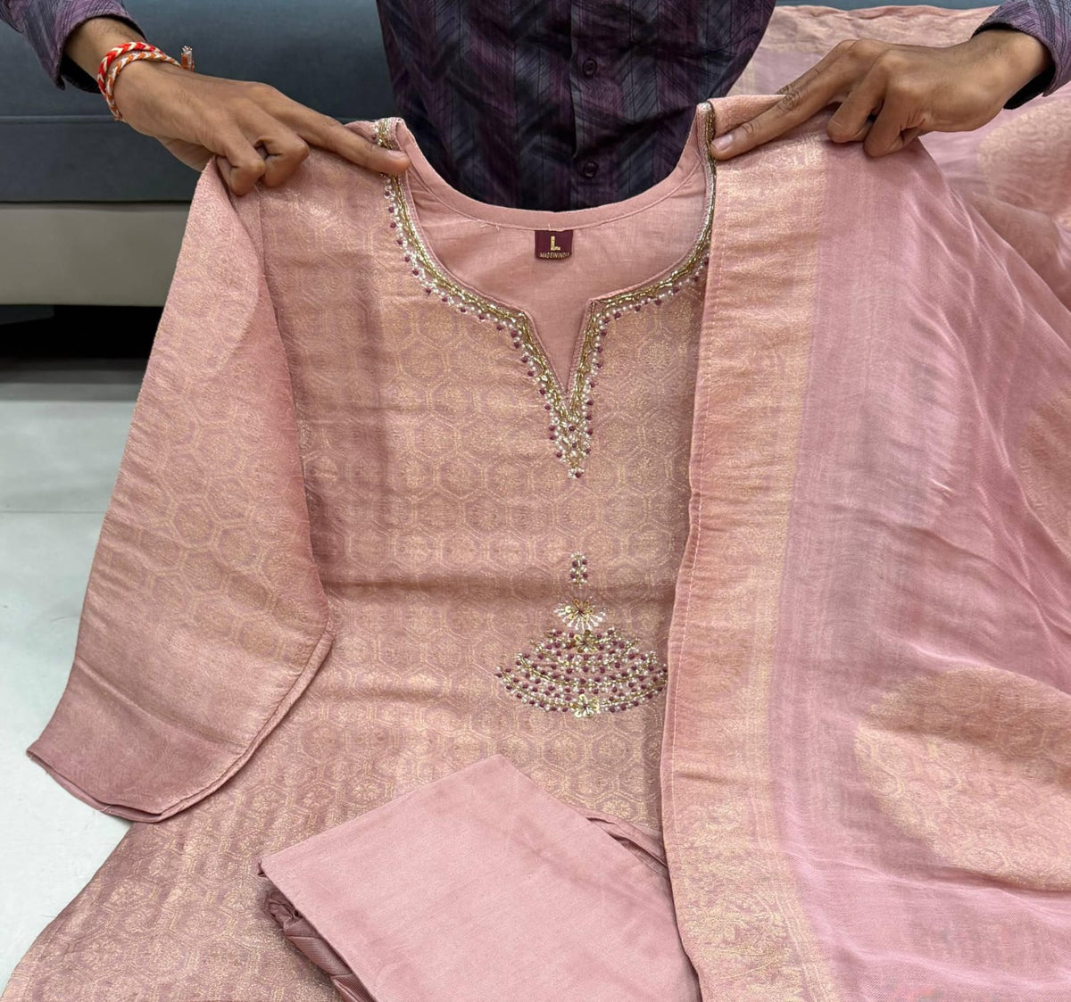 Back view of onion pink Banarasi top showing overall woven jacquard pattern and premium stitching finish - WishTown Fashion Club
