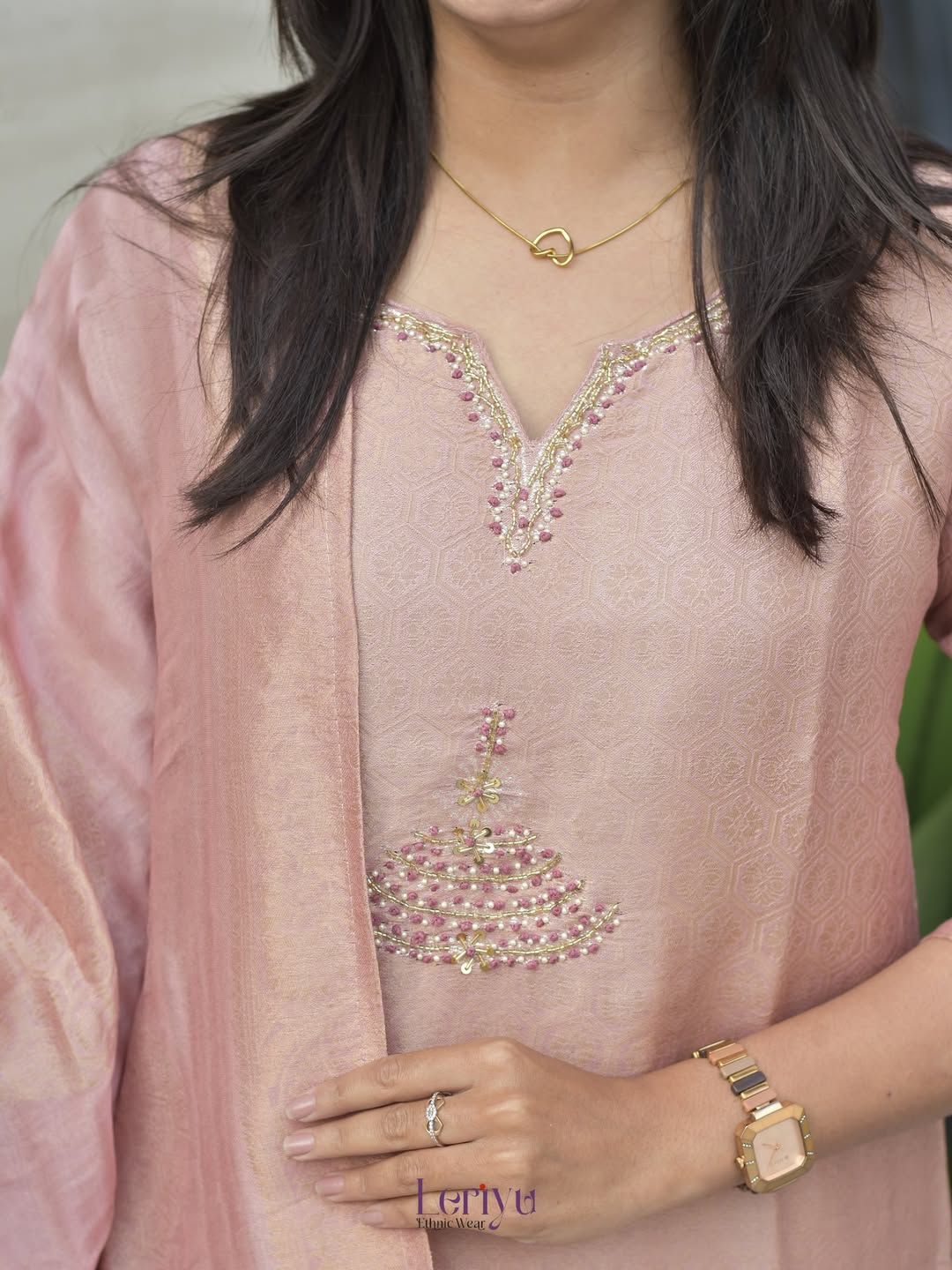 Detailed view of rich zari jacquard weaving patterns across the onion pink Banarasi dupatta - WishTown Fashion Club