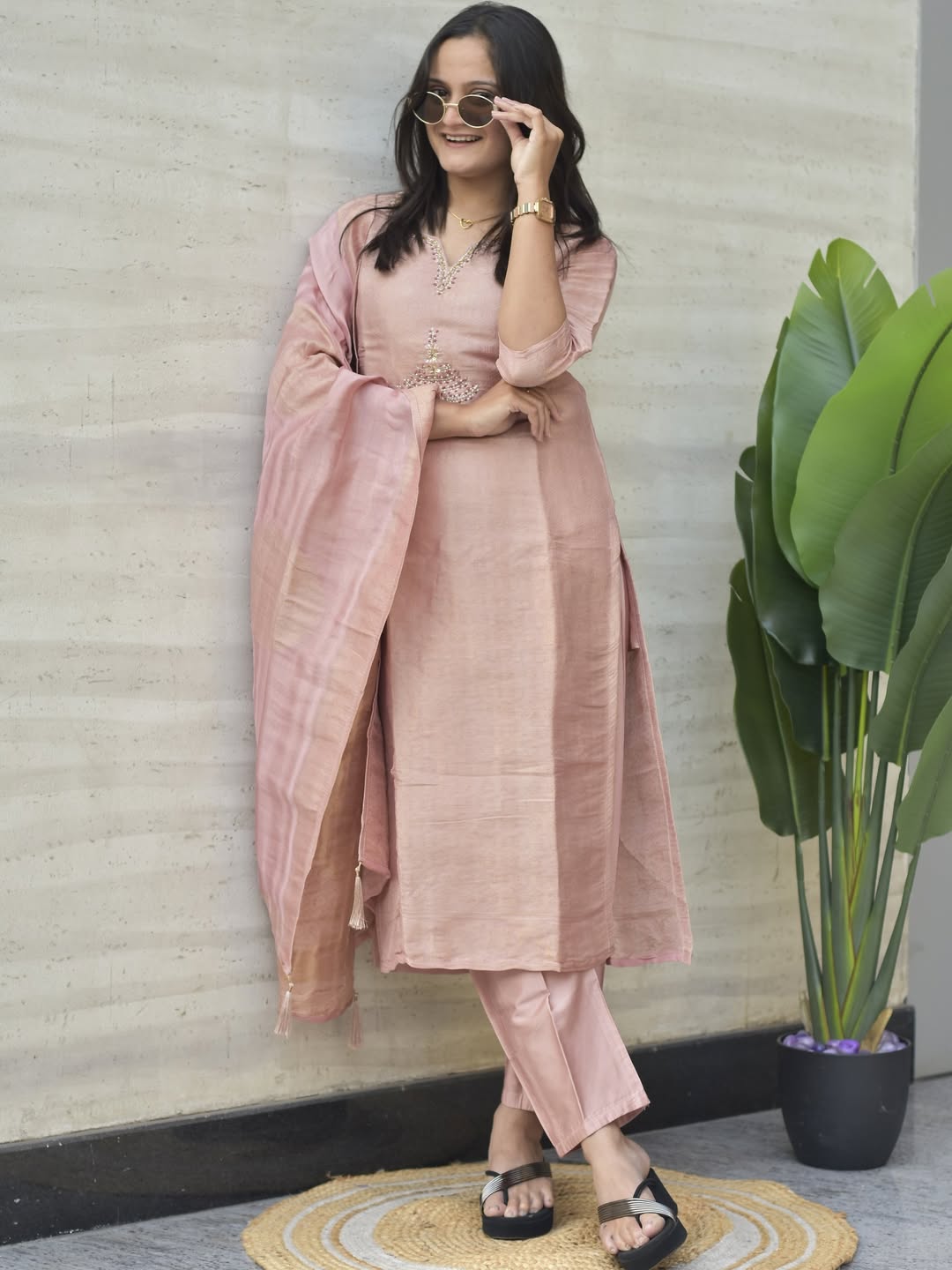 Side profile presentation of onion pink Banarasi suit top showing clean side slits and cotton inner lining - WishTown Fashion Club