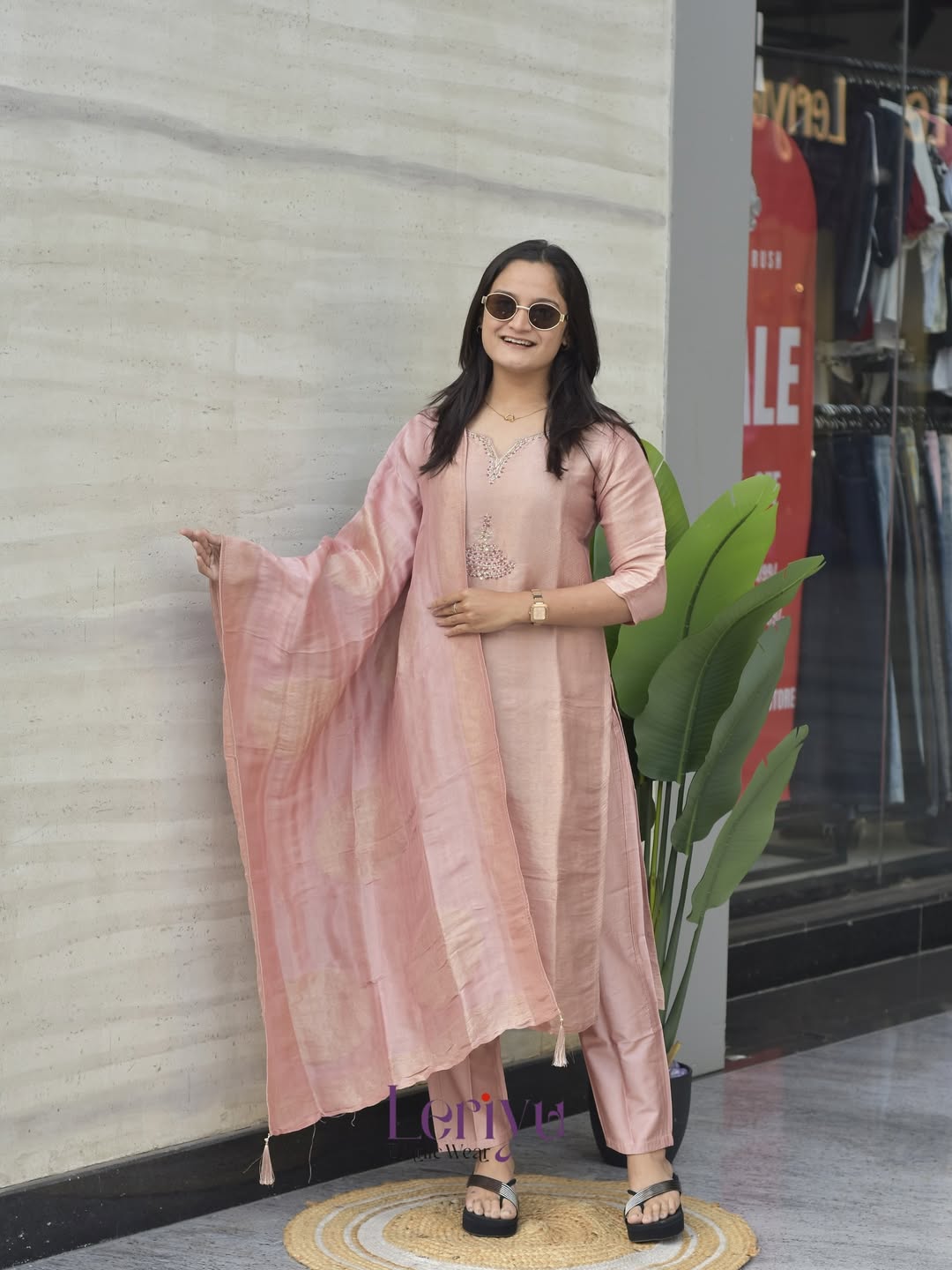 Front view of full four piece onion pink Banarasi suit set with dupatta silk pant and handwork neck - WishTown Fashion Club
