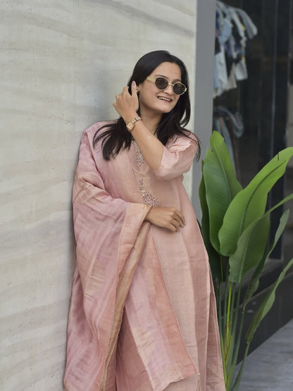Close up view of detailed zari handwork neck yoke and jacquard weaving on onion pink Banarasi kurti - WishTown Fashion Club