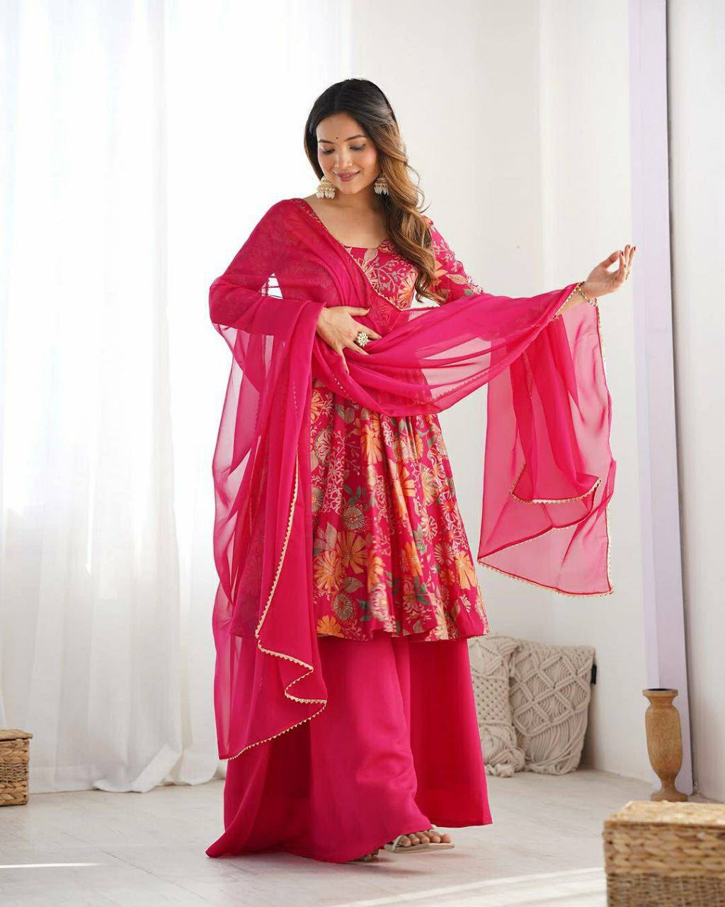 Side profile presentation of dark pink georgette kurti showing clean side slits and crepe inner lining - WishTown Fashion Club