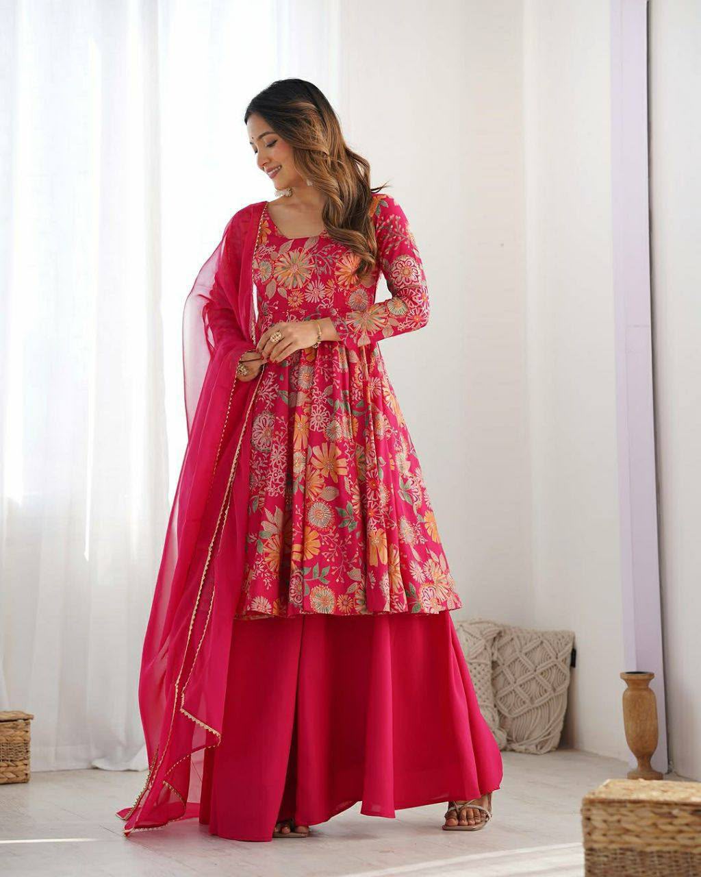 Close up view of vibrant printing work and clean neck stitching on dark pink faux georgette kurti yoke - WishTown Fashion Club