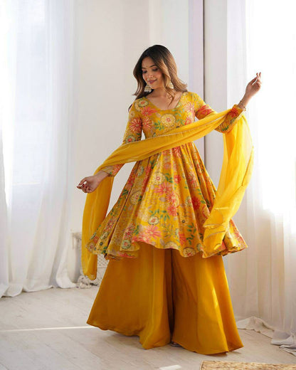 Close up view of vibrant printing work and clean neck stitching on yellow faux georgette kurti yoke - WishTown Fashion Club