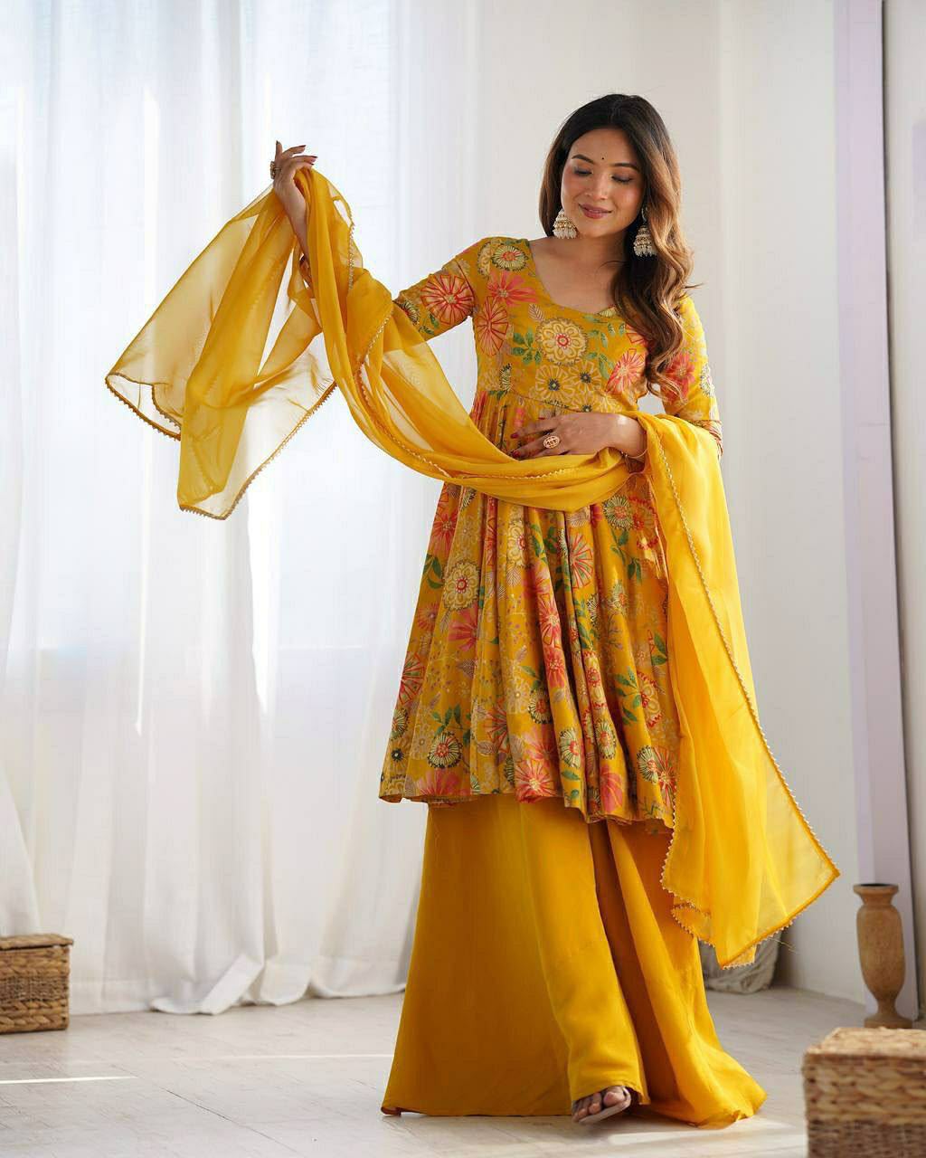 Front view of full three piece yellow georgette printed kurti sharara set displaying tunic printed pants and dupatta - WishTown Fashion Club