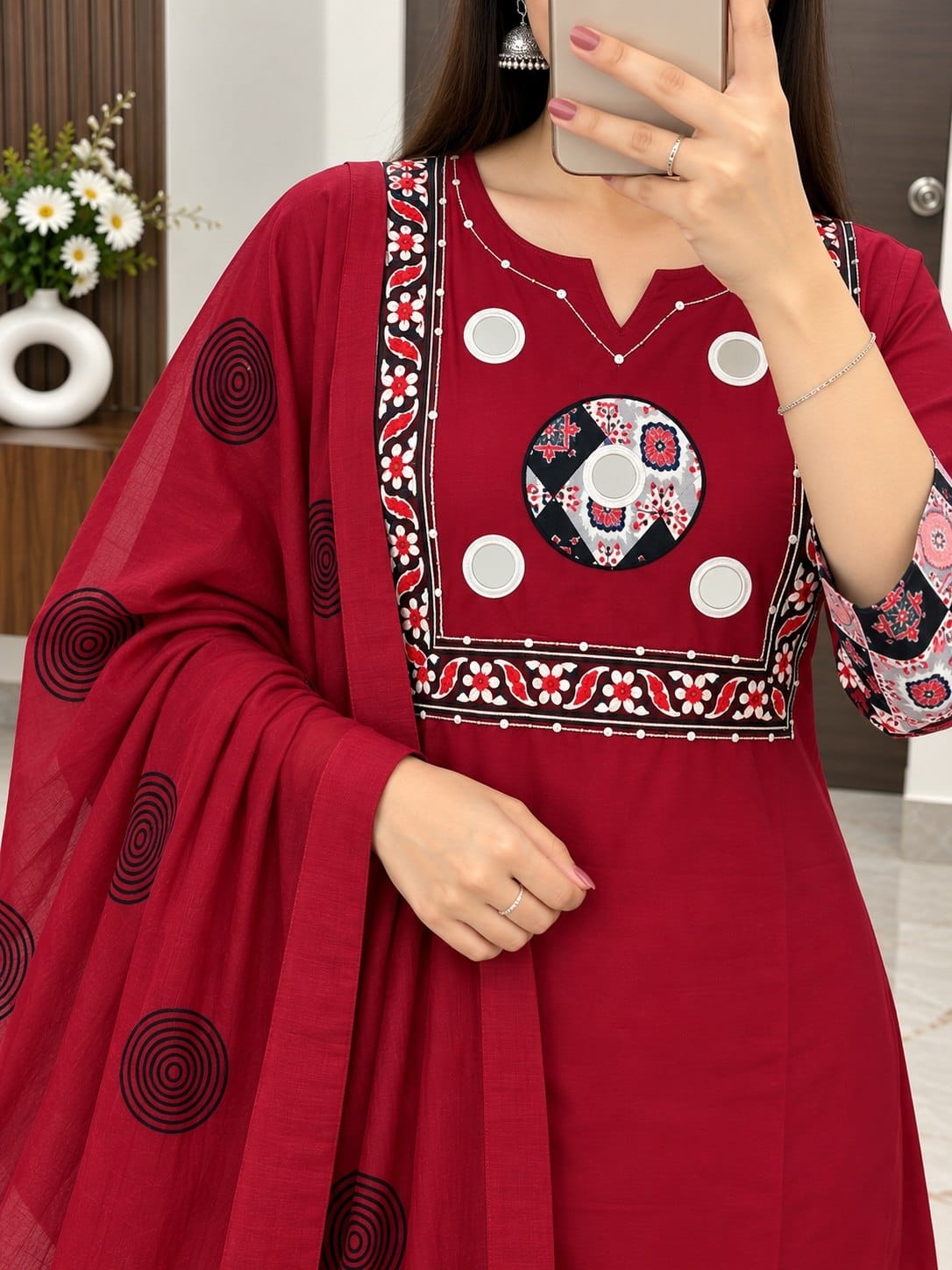 Side profile presentation of maroon pure cotton printed kurti showing clean side slits and soft cotton inner lining - WishTown Fashion Club