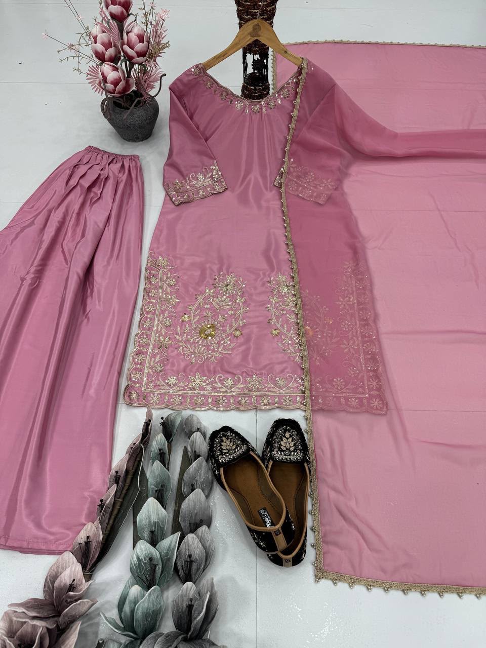 Full length shot of pink plain heavy natural creap free size sharara bottom measuring thirty-nine inches - WishTown Fashion Club