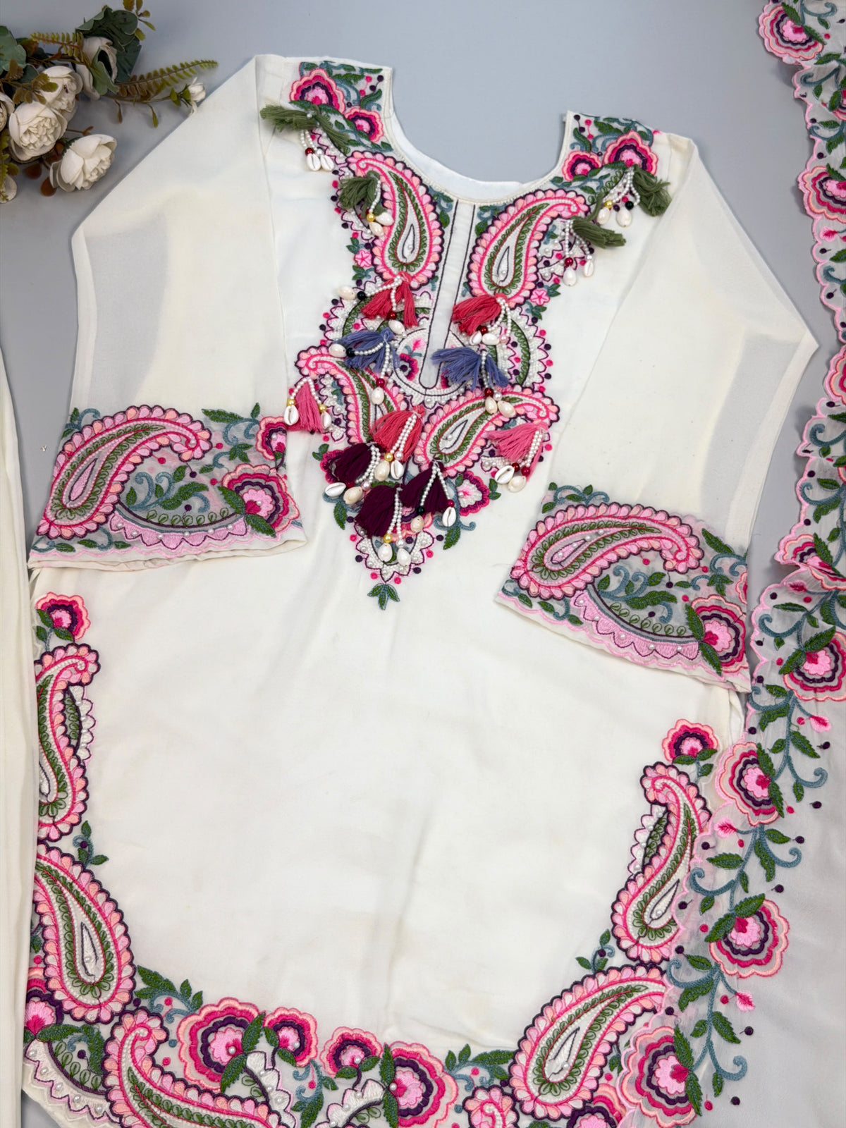 Side profile presentation of full sleeve white georgette top showing thirty-nine to forty inch length and soft inner lining - WishTown Fashion Club