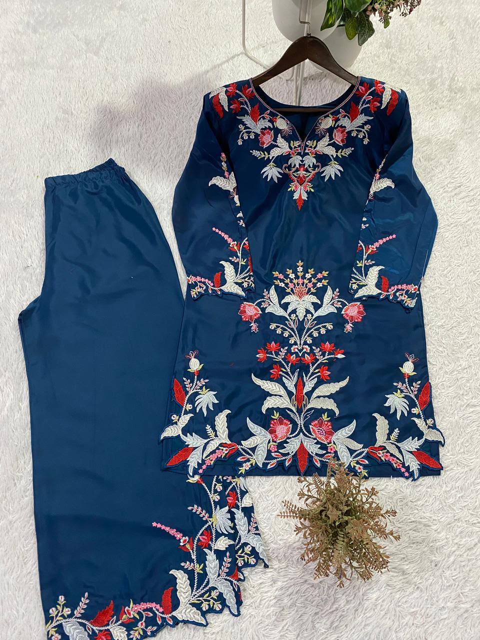 Full length shot of thirty-nine inch blue French crape free size palazzo pants with cut work borders - WishTown Fashion Club